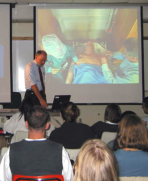 Dr. Fleming, M.D., Associate Professor in the department of Anesthesiology, leads his students 
through an online anesthesia administration to their virtual patient, "Stan".  Photo by Jeff van de Pol.